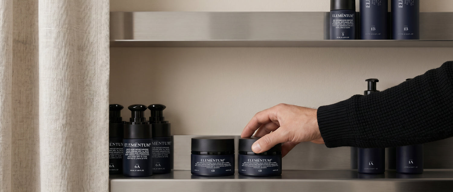 Hand reaching for a jar on a shelf with skincare products